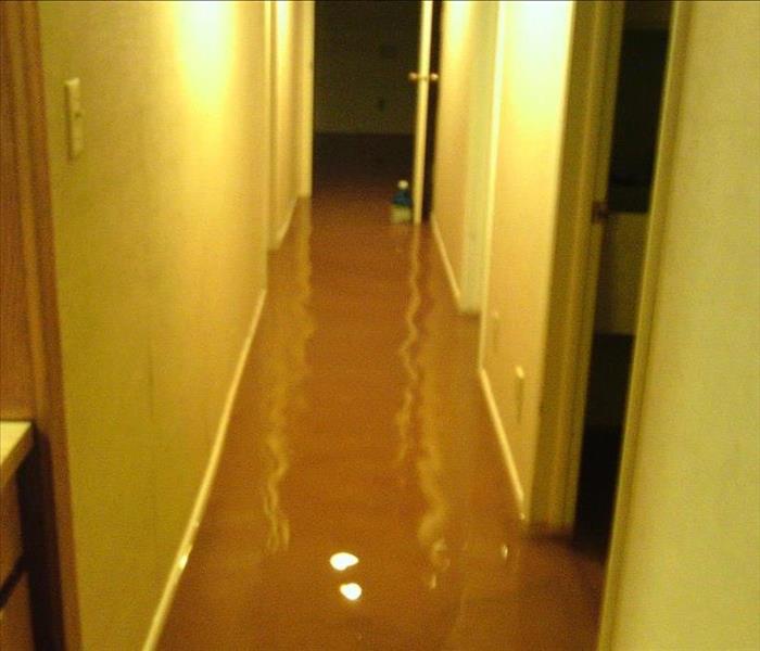 Flood water inside the hallway of a Cedar City home